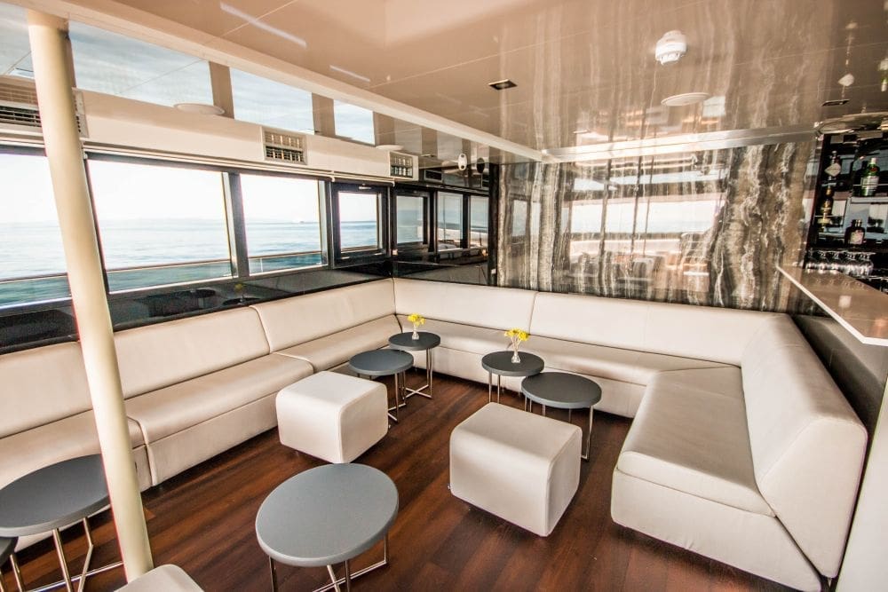 Check out the modern (and shaded) bar lounge aboard Out Adventures' gay cruise ship.