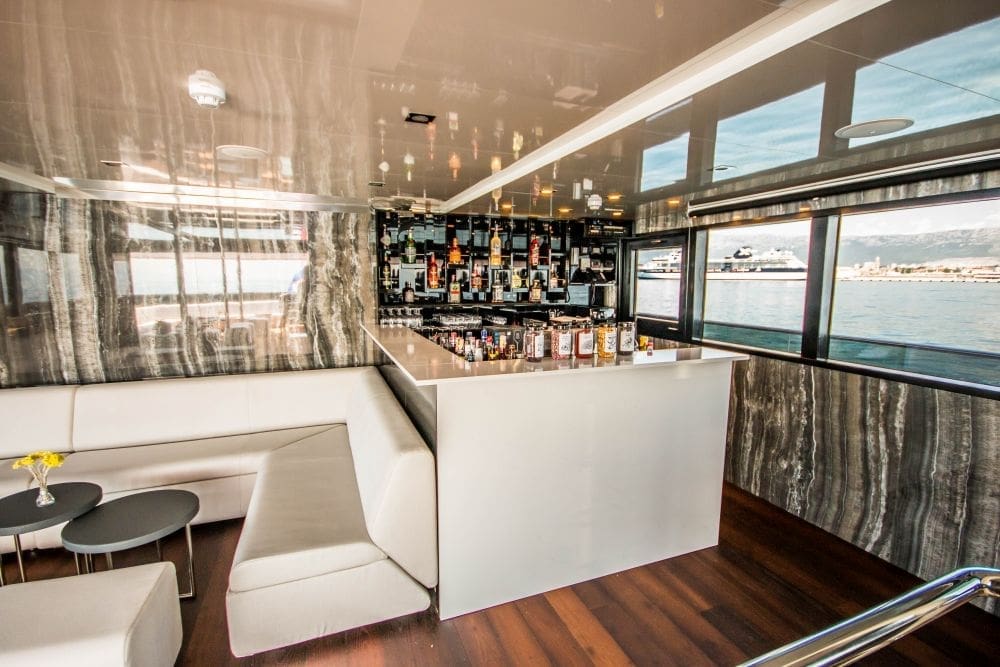 A snap showcasing the bar and lounge on Out Adventures' gay cruise ship.