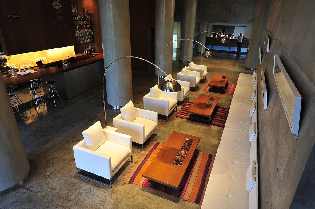The sleek and simple lobby of Design Suites Salta Hotel.
